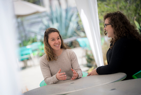 Women discussing a topic